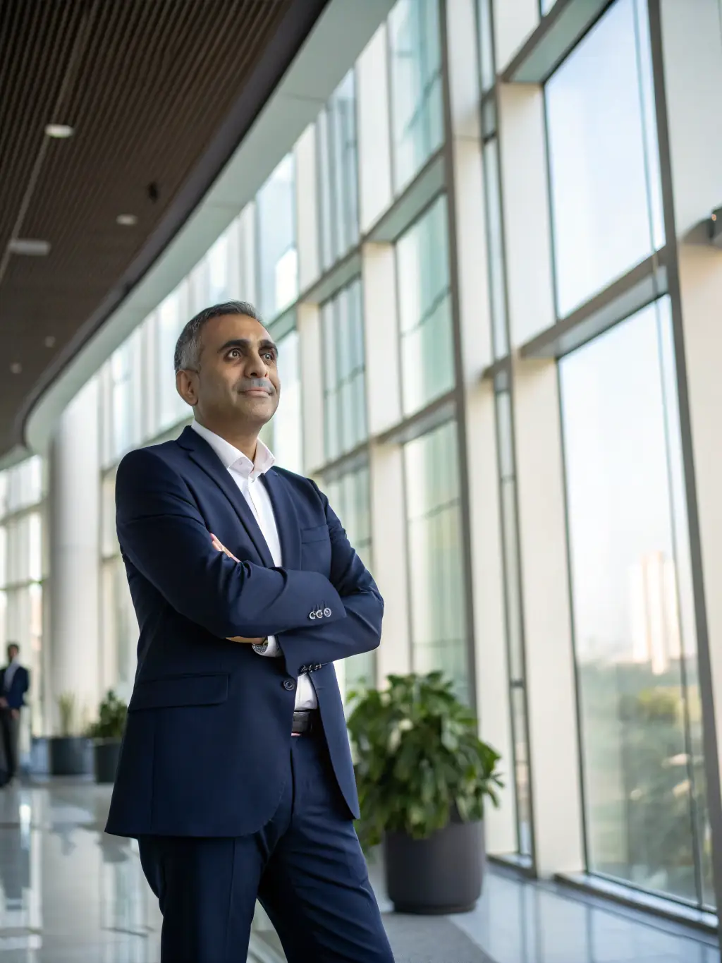 A professional consultant in a suit, advising a client in a modern office setting, representing Ggt prime's expert consulting services.